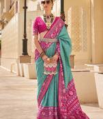 Patola silk Blend turquoise and rani pink patola print classic saree