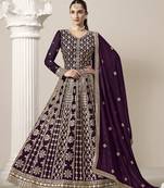 Faux georgette embroidered dark purple gown for festival