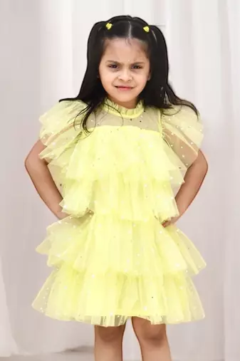 Yellow star layered frock