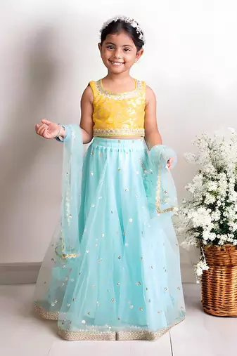 Yellow brocade choli with lehenga