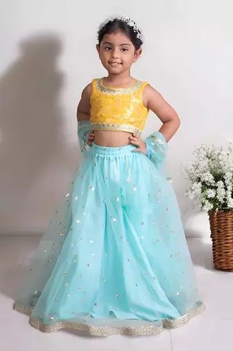 Yellow brocade choli with lehenga