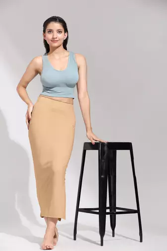 Trendmalls Light Peach Solid Nylon Soft Petticoat Skirt Saree Shape Wear for Women