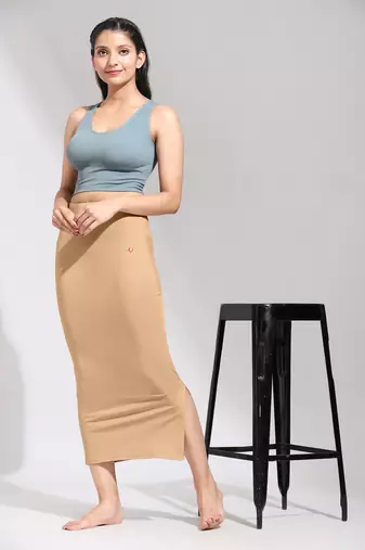 Trendmalls Light Peach Solid Nylon Soft Petticoat Skirt Saree Shape Wear for Women