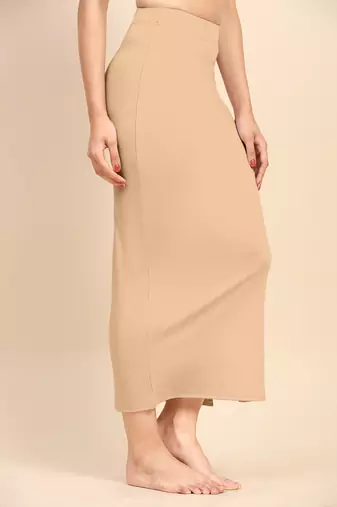 Trendmalls Light Peach Solid Nylon Soft Petticoat Skirt Saree Shape Wear for Women