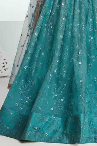 rama color embroidered net lehenga set choli with dupatta