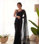 Black solid plain georgette saree with graceful embroidered blouse