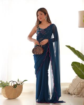 Teal solid plain georgette saree with graceful embroidered blouse 1