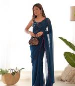 Teal solid plain georgette saree with graceful embroidered blouse