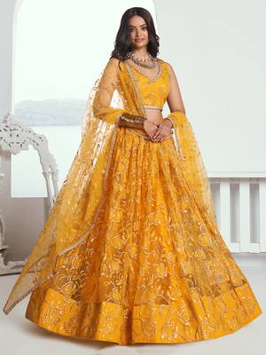 endearing yellow color embroidered soft net lehenga set choli with dupatta 1