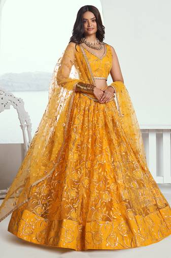 Endearing Yellow Color Embroidered Soft Net Function Wear Lehenga Choli