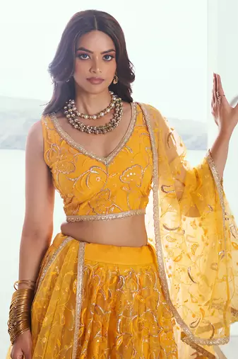 endearing yellow color embroidered soft net lehenga set choli with dupatta