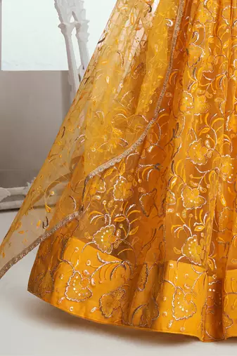 endearing yellow color embroidered soft net lehenga set choli with dupatta