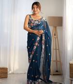 Teal georgette c girlie embroidered sequins work saree