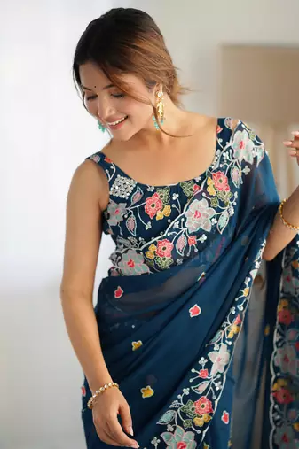 Teal georgette c girlie embroidered sequins work saree