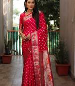 Red dola silk Woven paithani saree with festive bandhej print