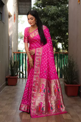 Pink dola silk blend Woven paithani saree with festive bandhej print