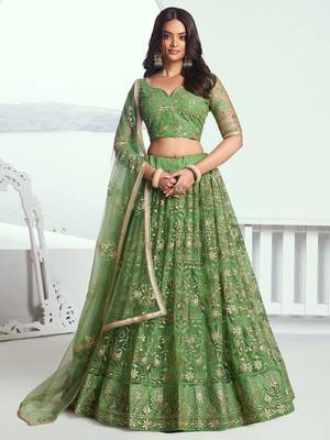 green color embroidered soft net mehendi lehenga set choli with dupatta 1