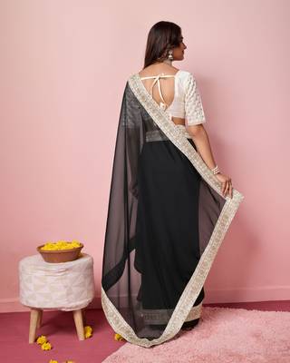 Girlie black organza saree with ethnic embroidery work on border and blouse 2