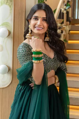 Fancified Green Sequins Georgette Mehendi Wear Lehenga Choli