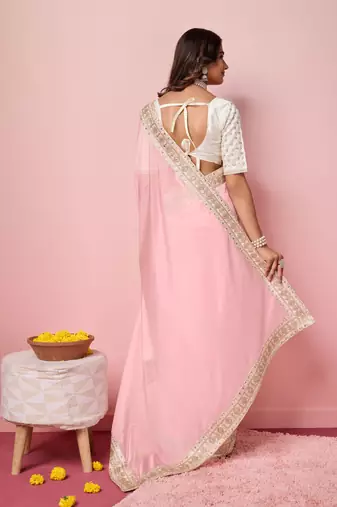 Girlie rose pink organza saree with ethnic embroidery work on border and blouse