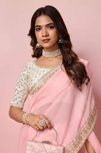Girlie rose pink organza saree with ethnic embroidery work on border and blouse