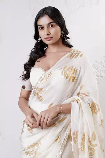 Ivory and gold organza printed saree with blouse