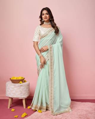 Girlie sea green organza saree with ethnic embroidery work on border and blouse 1