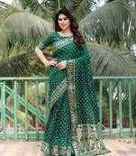 Green dola silk c Woven border pallu designer with bandhej work saree