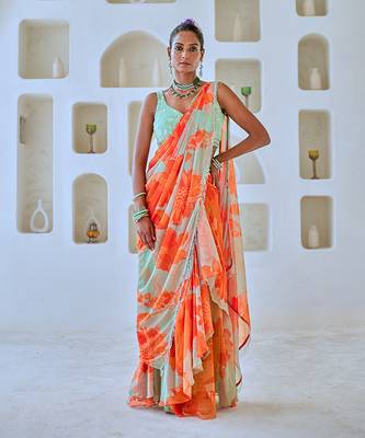 Mint green floral chiffon draped saree with embellished blouse 1