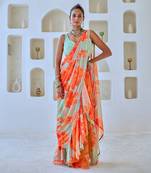 Mint green floral chiffon draped saree with embellished blouse
