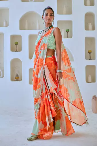 Mint green floral chiffon draped saree with embellished blouse