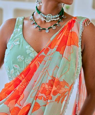 Mint green floral chiffon draped saree with embellished blouse 4