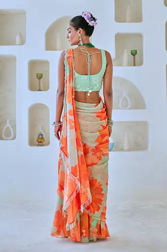 Mint green floral chiffon draped saree with embellished blouse