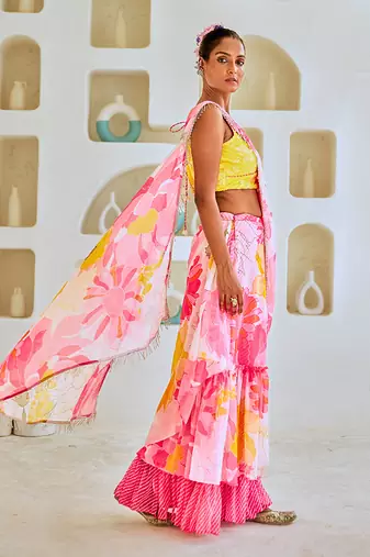 White & pink floral chiffon draped saree with embellished blouse