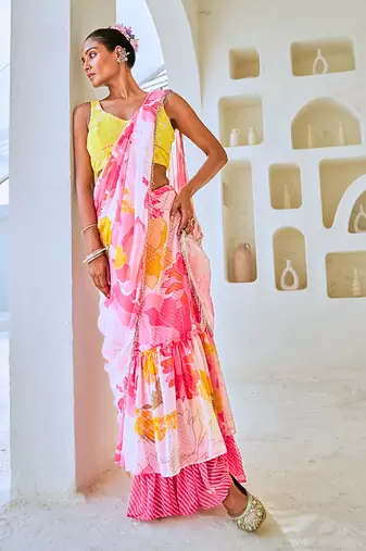 White & pink floral chiffon draped saree with embellished blouse