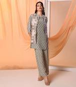 Green earaya printed kurta set with embellished jacket