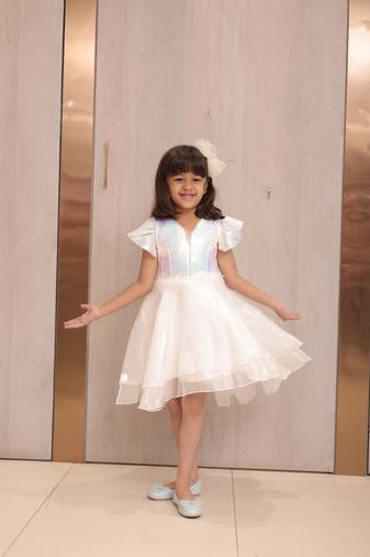 Pearl white coloured party wear frock for girls
