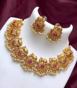 Exquisite elephant motif gold necklace set with pearl accents - traditional indian jewelry"