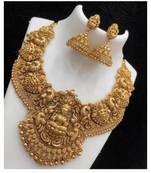 Antique gold temple jewelry set: intricate lakshmi necklace with jhumka earrings