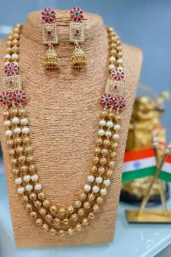 Exquisite gold-plated floral kundan necklace set with pearl accents - traditional indian bridal jewelry