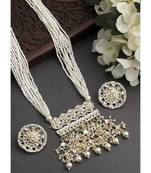 Elegant pearl and kundan multi-strand necklace set with traditional stud earrings | indian wedding jewelry