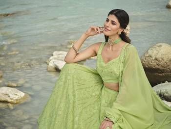 Parrot green sequins and thread embroidered faux georgette Wedding wear semi stitched lehenga 3
