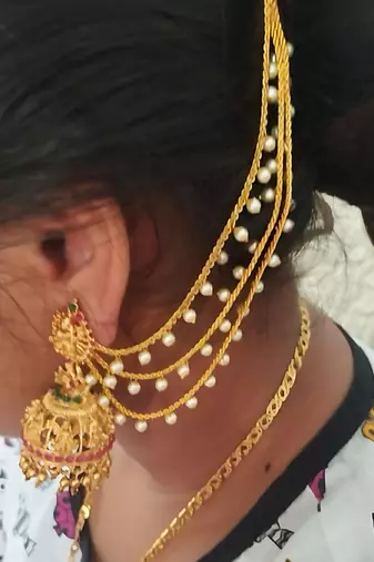 Temple lakshmi design jhumka with pearl ear chain - antique gold south indian traditional earring