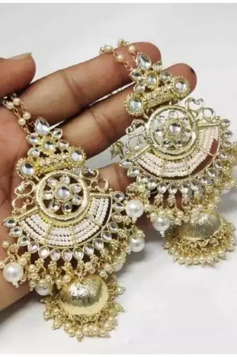 Elegant kundan jhumka earrings with pearl drops - traditional indian wedding jewelry