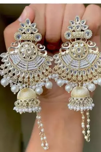 Elegant kundan jhumka earrings with pearl drops - traditional indian wedding jewelry