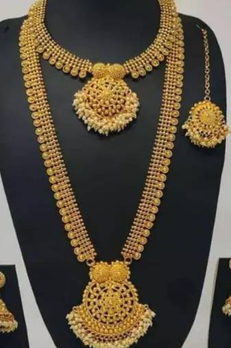 Luxurious gold-plated south indian bridal jewelry set - necklace, long chain, earrings, and tikka
