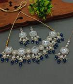 Elegant kundan-style mint pink and white necklace, earrings, and tikka set