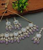 Elegant kundan-style purple and white necklace, earrings, and tikka set
