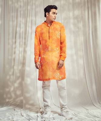 Yellow and orange floral print kurta. 1