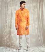 Yellow and orange floral print kurta.